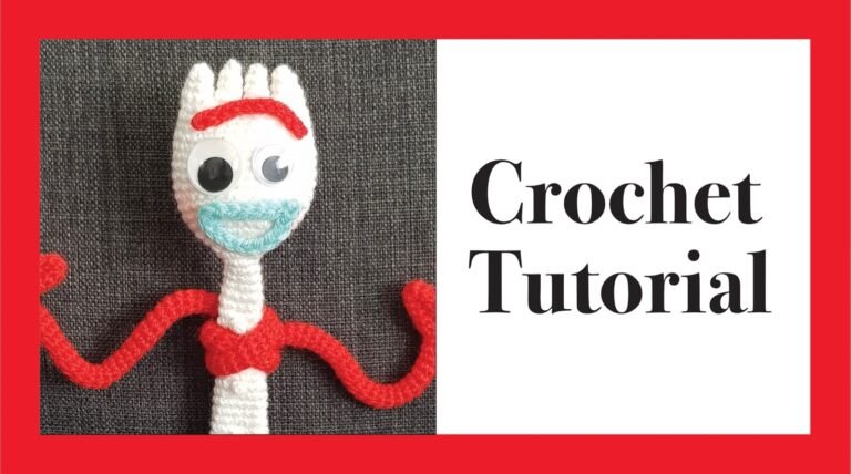A crochet doll with a face Description automatically generated