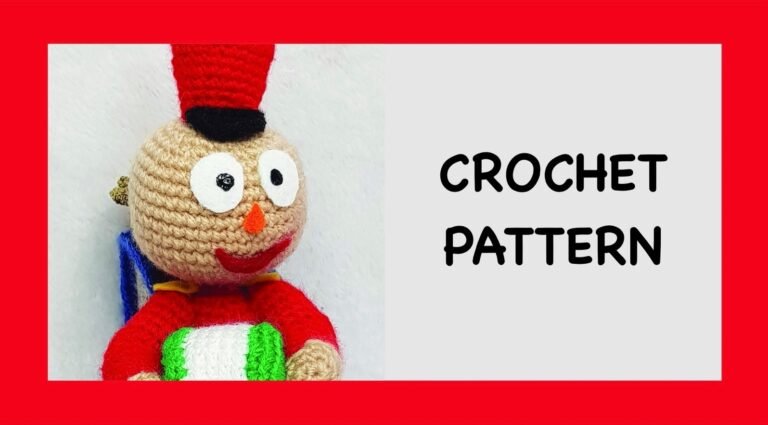 A close-up of a crochet toy Description automatically generated